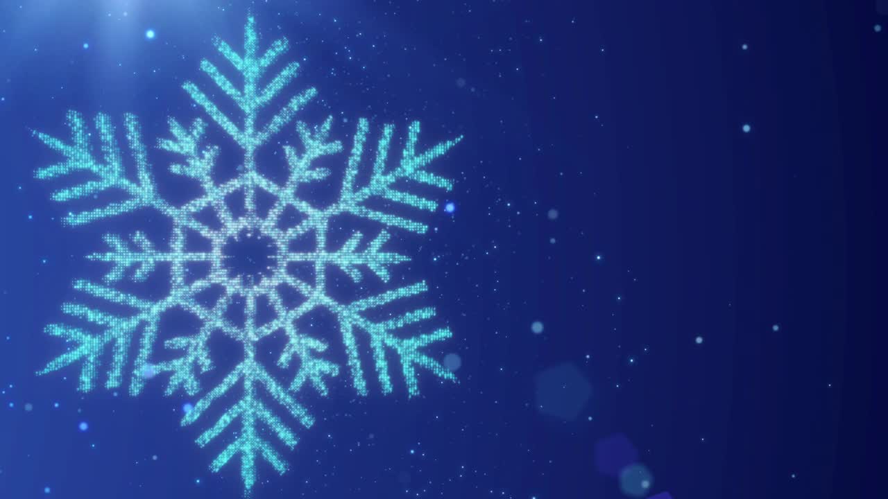 蓝色背景上的雪花，闪闪发光的粒子，和镜头闪光为圣诞节背景视频下载