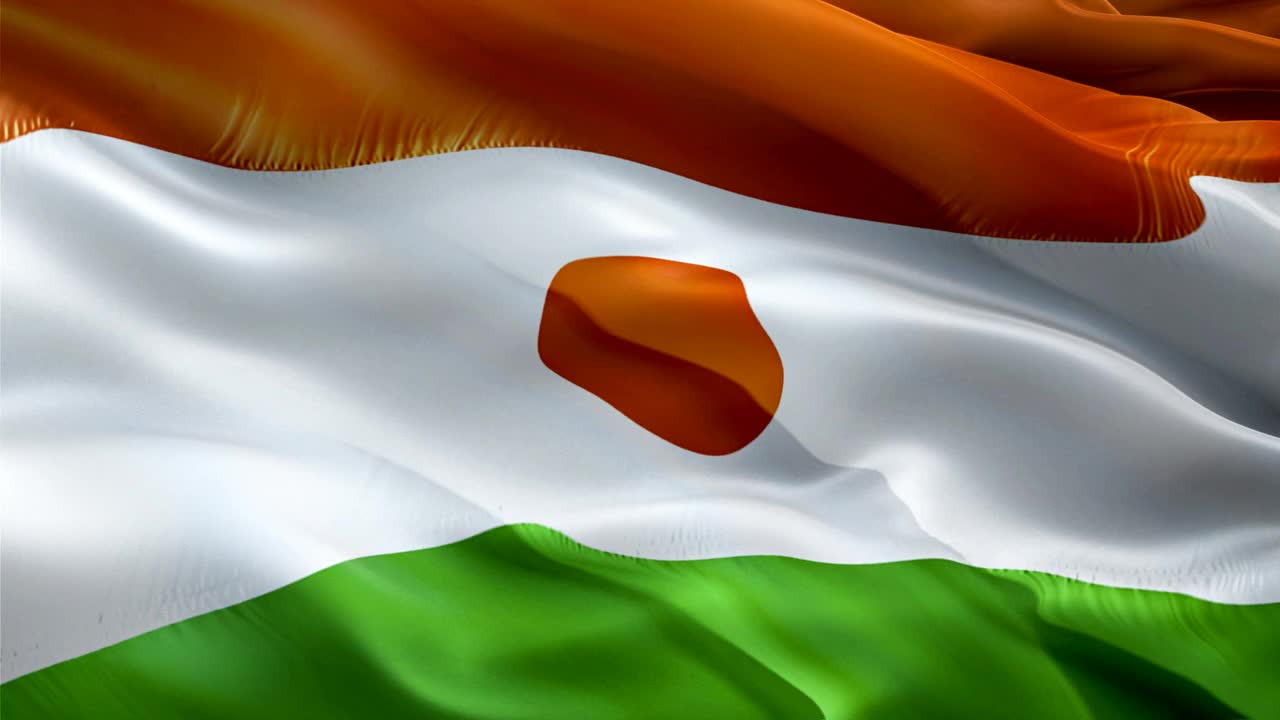 尼日尔的旗帜。国家3d尼日尔国旗飘扬。标志尼日尔无缝循环动画。尼日尔国旗高清背景。尼日尔国旗特写1080p全高清视频演示。尼日尔国旗的胜利日视频素材