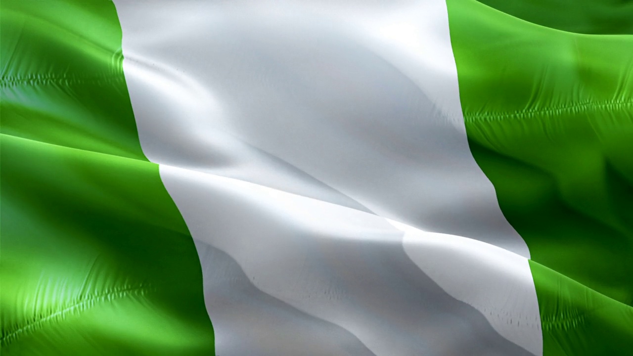 尼日利亚的旗帜。3d尼日利亚国旗挥舞视频。标志尼日利亚无缝循环动画。尼日利亚国旗高清分辨率背景。尼日利亚国旗特写1080p高清视频独立日，胜利日视频素材