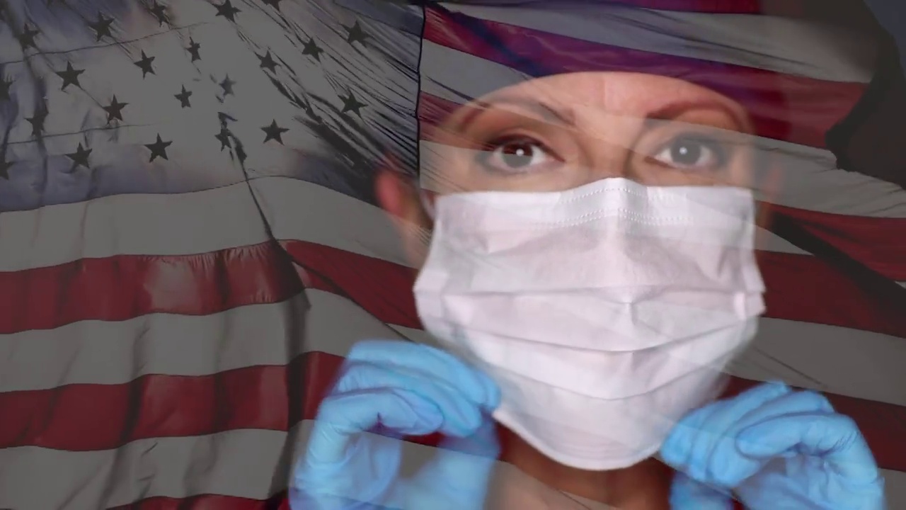 女医生或护士戴上医用口罩，伴着鬼影慢动作挥舞美国国旗。视频下载