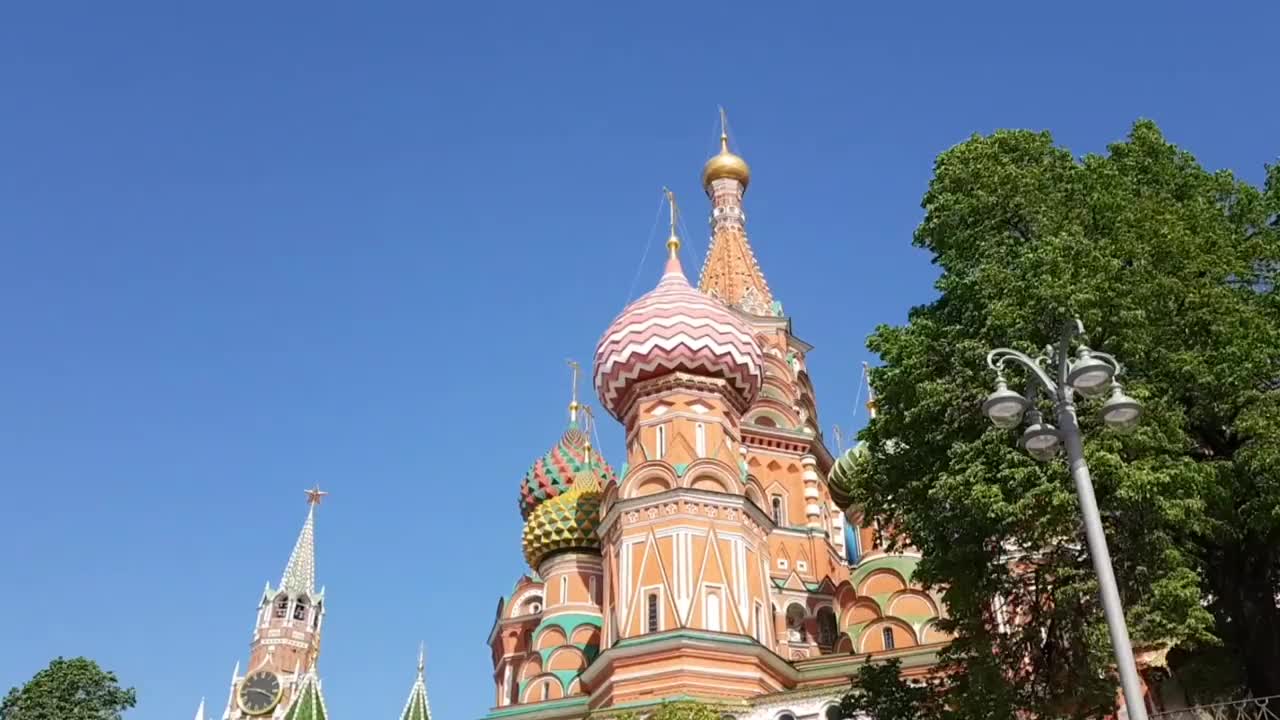 莫斯科斯帕斯卡亚塔和圣巴西尔大教堂白天的时间间隔视频素材