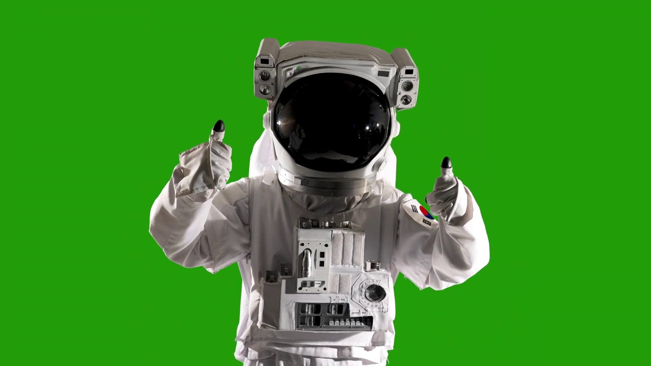 色度键-宇航员从背后竖起大拇指的样子视频下载