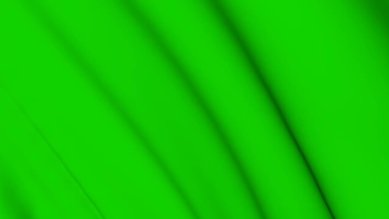 风中的绿色织物。视频下载
