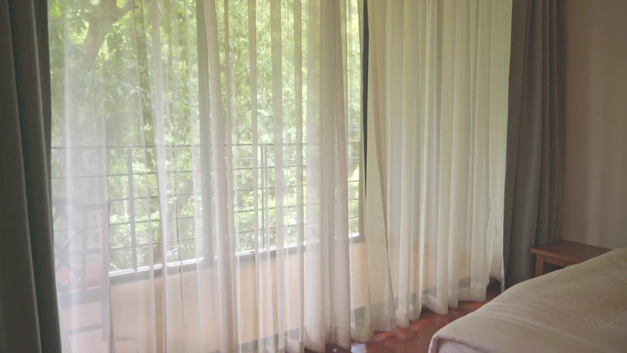 空白色窗帘和阳光作为背景视频素材