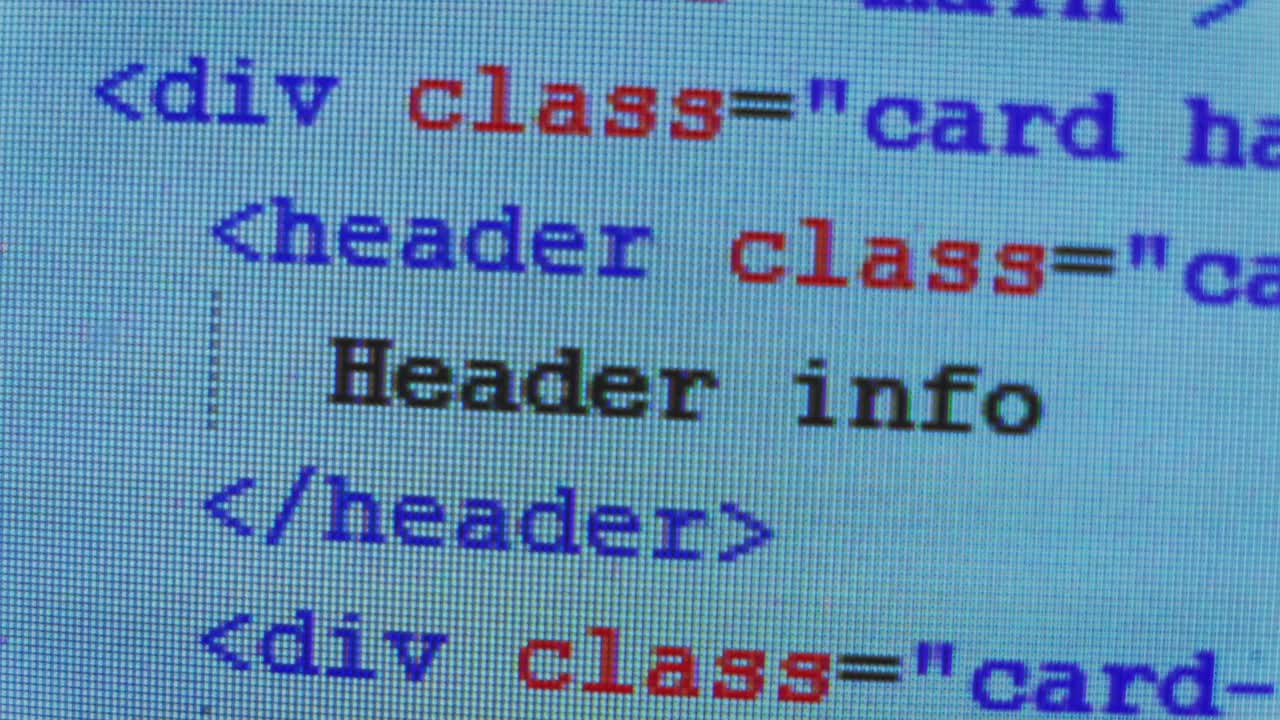 网页代码HTML在监视器屏幕上拍摄宏视频下载