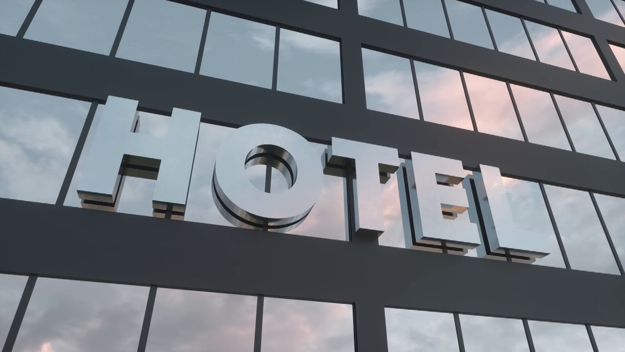 现代玻璃摩天大楼上的酒店招牌。旅游及旅游概念视频下载