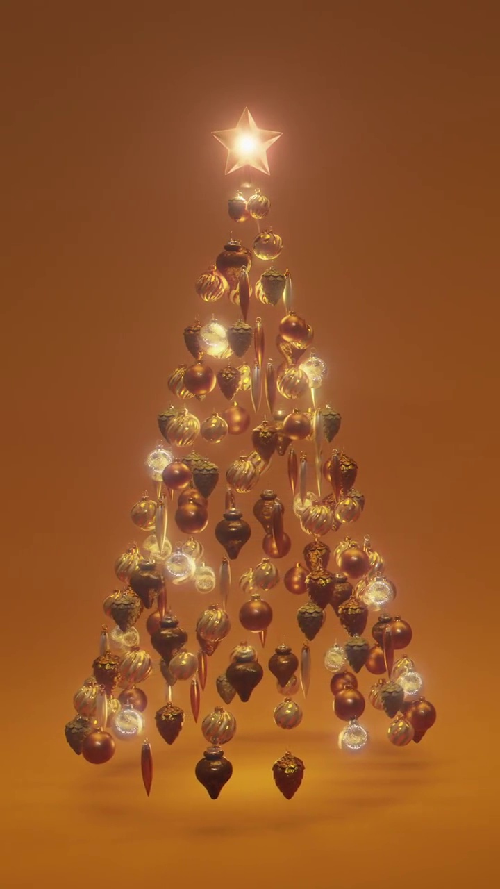 美丽的抽象圣诞树由悬浮的圣诞装饰品制成视频下载