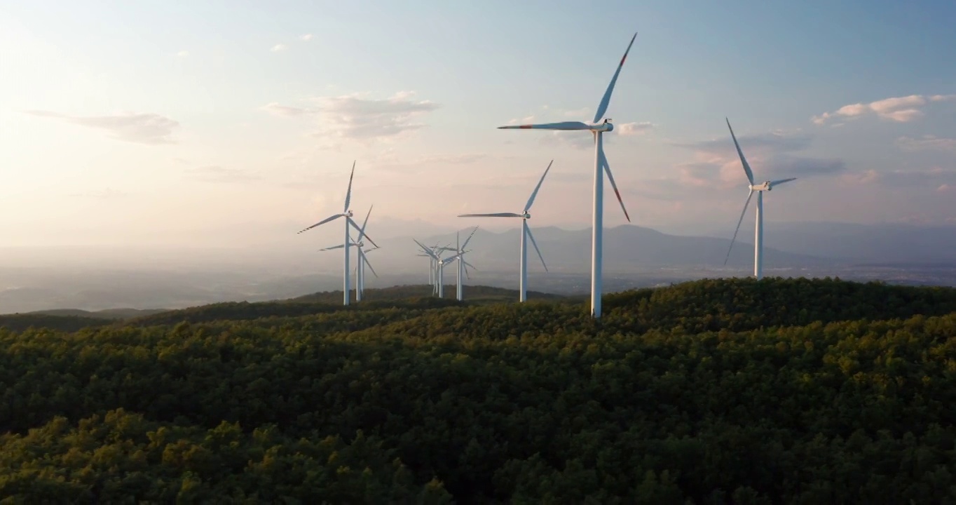 航拍的风车旋转的力量，风力和产生可再生能源的绿色生态方式，以地球上的日落。视频素材