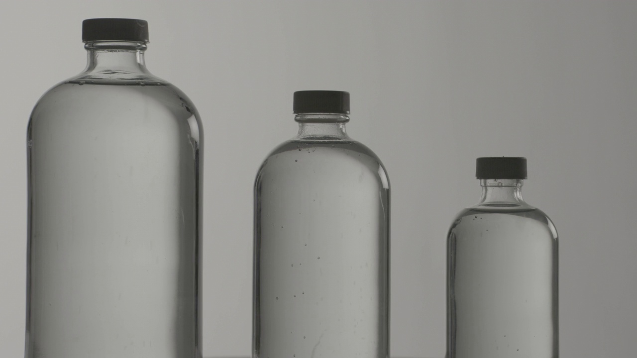 3透明瓶子旋转灯光效果视频下载