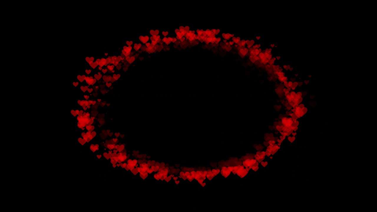 旋转的红心的椭圆形框架，在黑色背景上的抽象动画视频素材