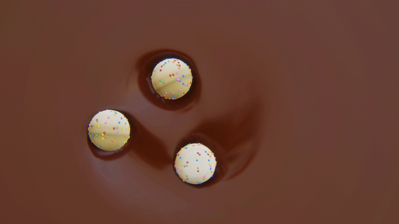 3个巧克力糖果的4k视频。视频素材