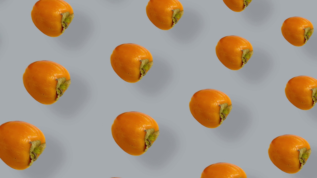 鲜艳图案的鲜橙柿子。无缝的柿子图案。波普艺术设计。现实的动画。4 k视频运动视频下载