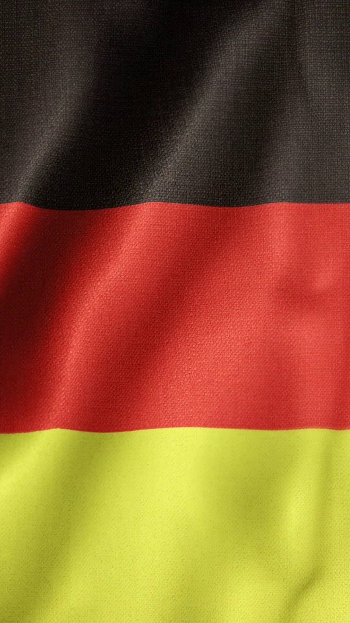 德国垂直国旗动画库存视频-德国国旗在循环和纹理3d渲染背景-高度详细的织物图案和可循环-德国联邦共和国视频下载