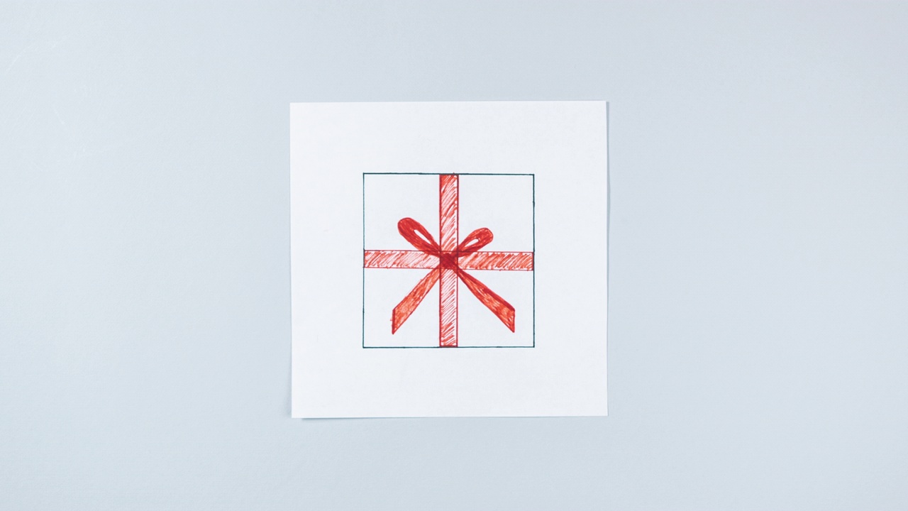用牛皮纸扎上红丝带的礼盒图出现在白纸上。那就用真正的礼物代替画过的手。灰色背景。视频下载