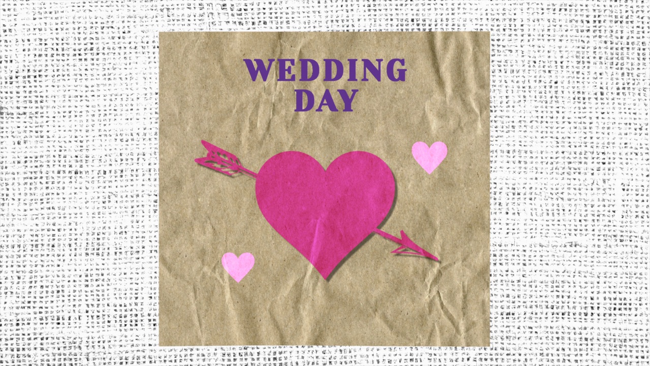 婚礼当天，用印有心形和箭头的复古纸视频素材
