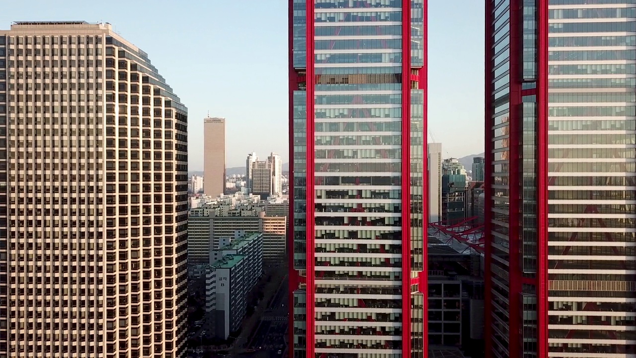 韩国首尔永登浦区汝矣岛金融区63大厦附近的摩天大楼上的日落视频下载