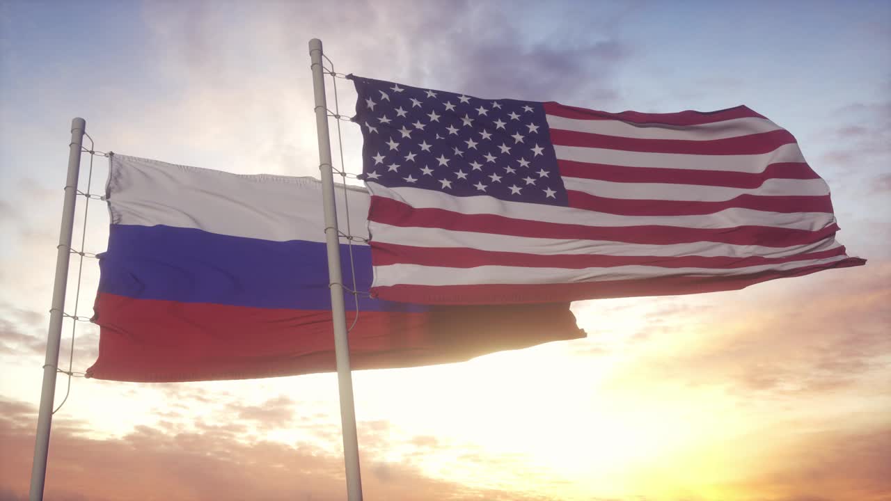 俄罗斯联邦和美利坚合众国的国旗在风中飘扬视频素材
