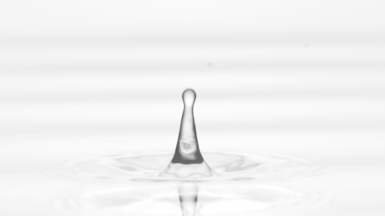 灰色液体滴落在液体表面形成圆圈视频下载