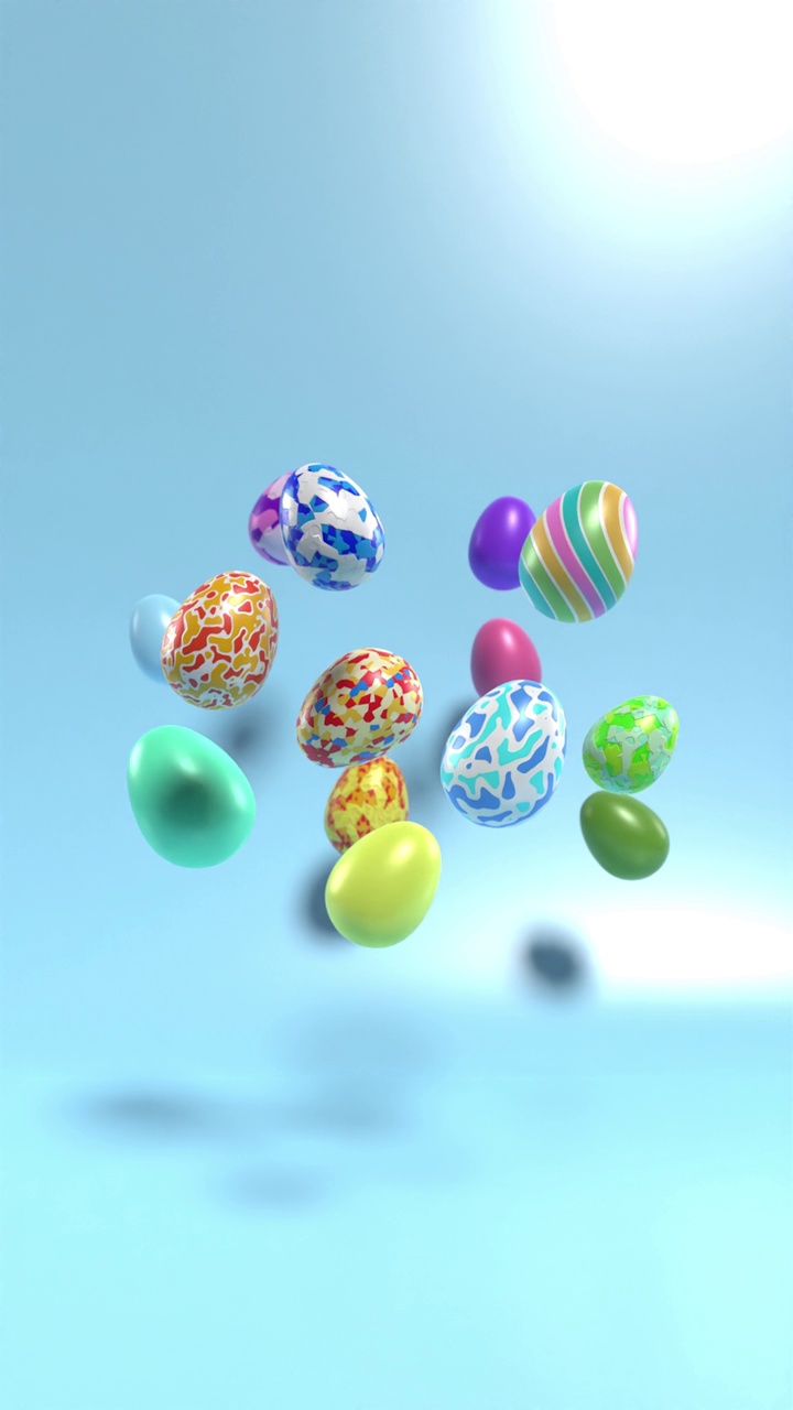 不同的彩色装饰复活节彩蛋在垂直4K分辨率的反射蓝色表面流动视频下载