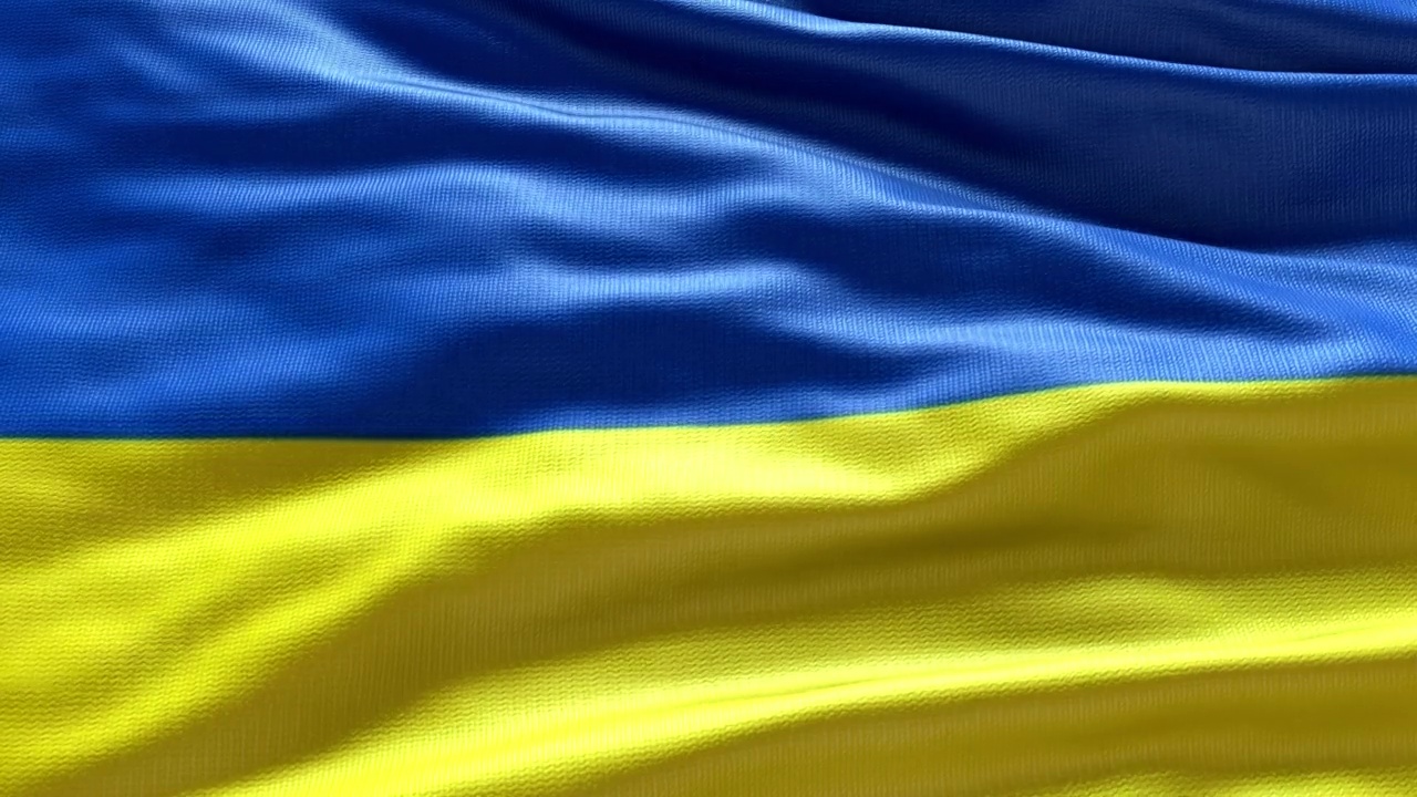 乌克兰国旗在风中飘扬。乌克兰国旗的4k动画。国家的象征。纹理黄色和蓝色图形织物视频素材