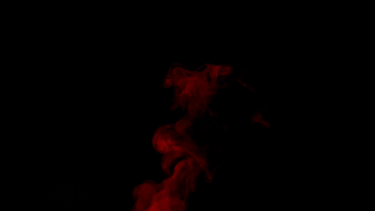 黑色背景上的红色蒸汽慢动作。视频素材