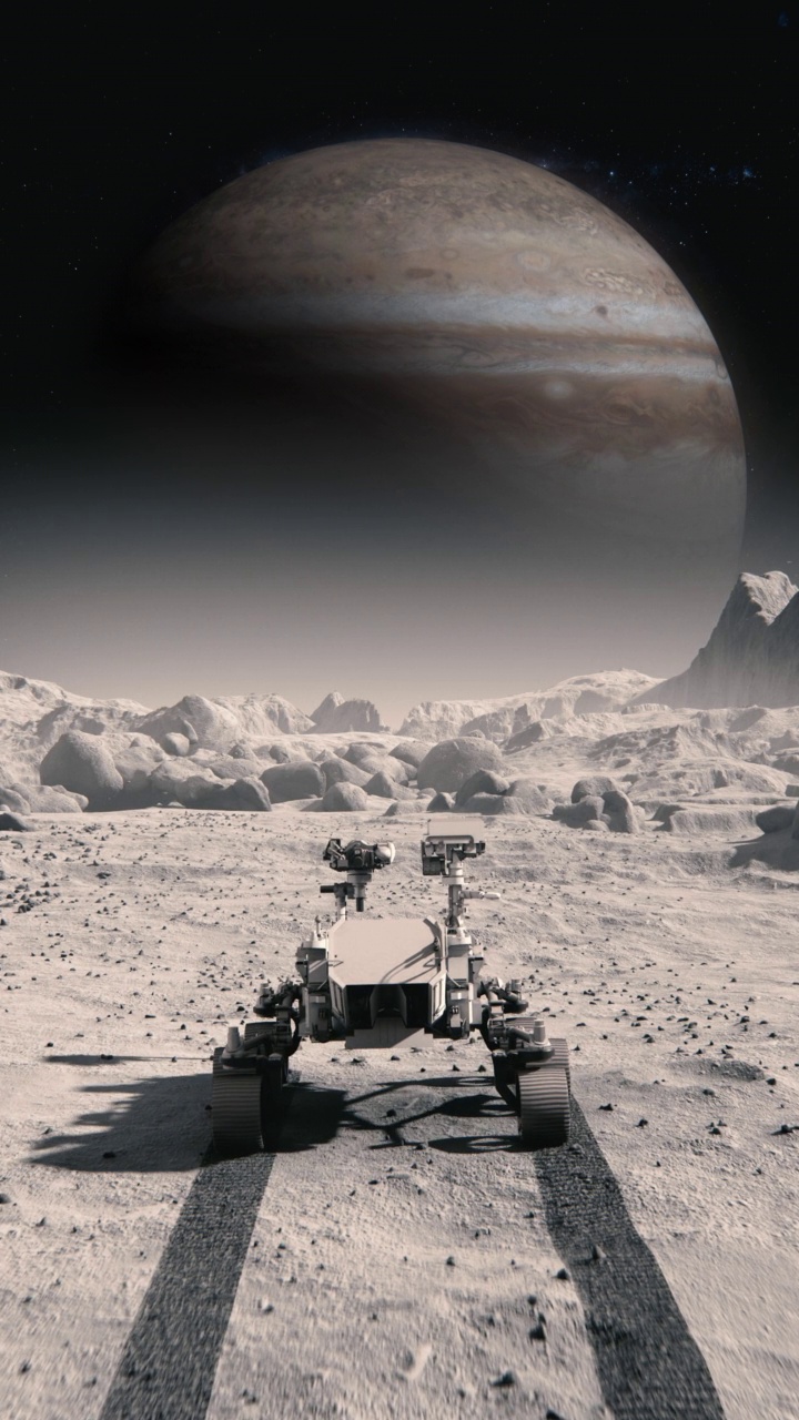 美国国家航空航天局火星发现漫游者正在穿越月球表面向木星行进。月球表面被岩石覆盖。先进技术，太空探索/旅行，殖民概念。人类的重要时刻。视频下载