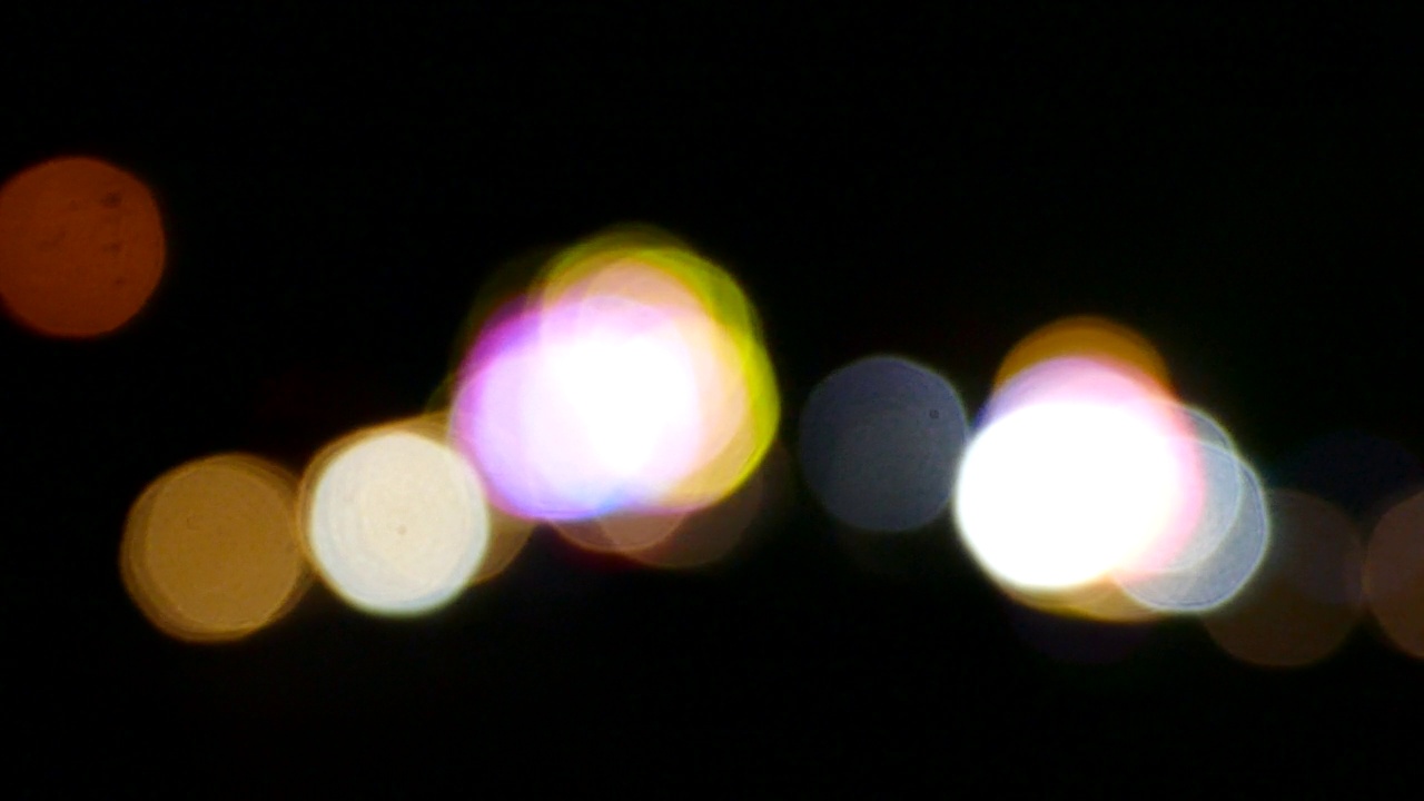 抽象的抽象的圆形散景从夜间的焦点视频素材