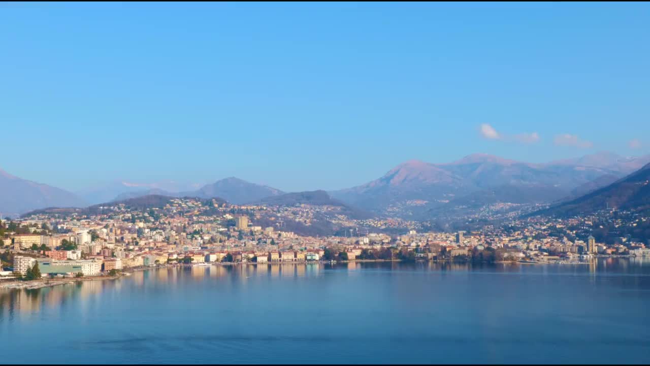 全景的卢加诺市和阿尔卑斯湖卢加诺和山在提契诺视频素材