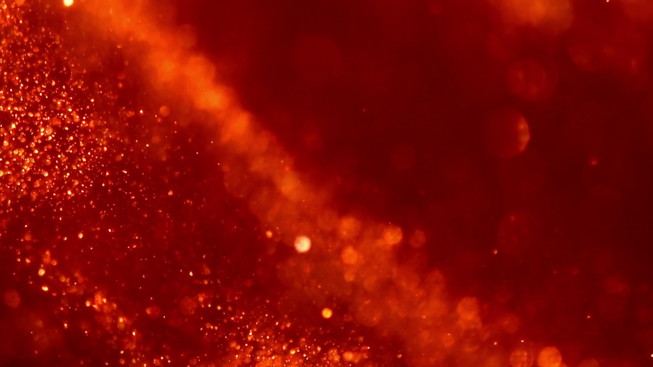 抽象的红色金色闪亮颗粒的波浪运动。视频素材