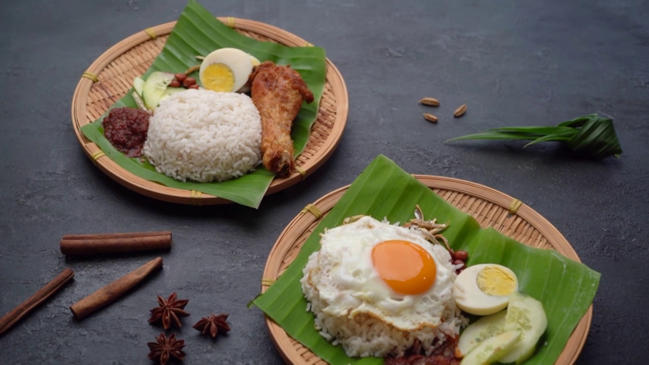 这是马来西亚传统的椰子饭，配上黑色背景的参巴酱视频素材