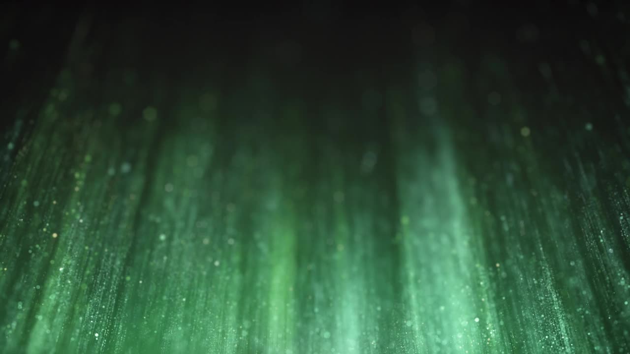 穿过闪闪发光的粒子飞行-绿色版本，可循环-抽象背景视频素材