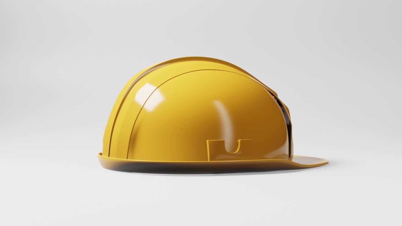 无缝环形黄色安全帽施工头盔运动旋转360度角在白色背景。商业和工业安全理念。4K镜头视频运动图形视频下载