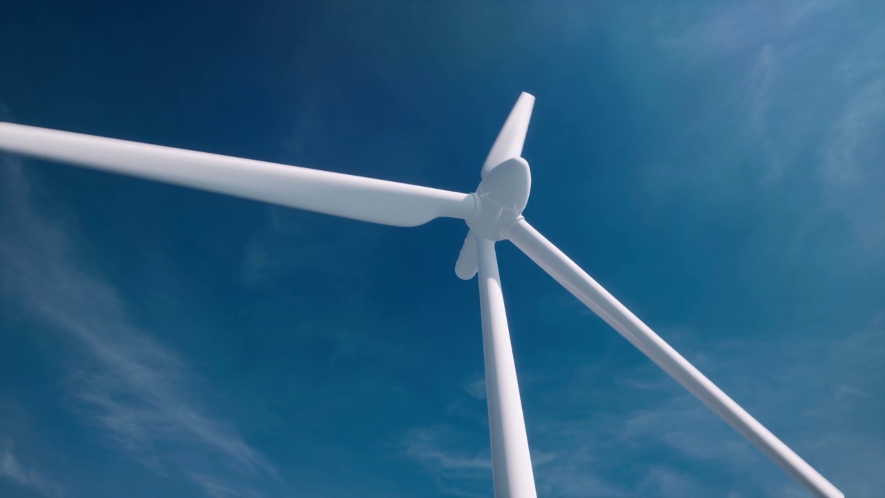 以蓝天为背景的3d风电场。可再生能源发电。环境保护的概念。逼真的3d动画风力涡轮机视频素材