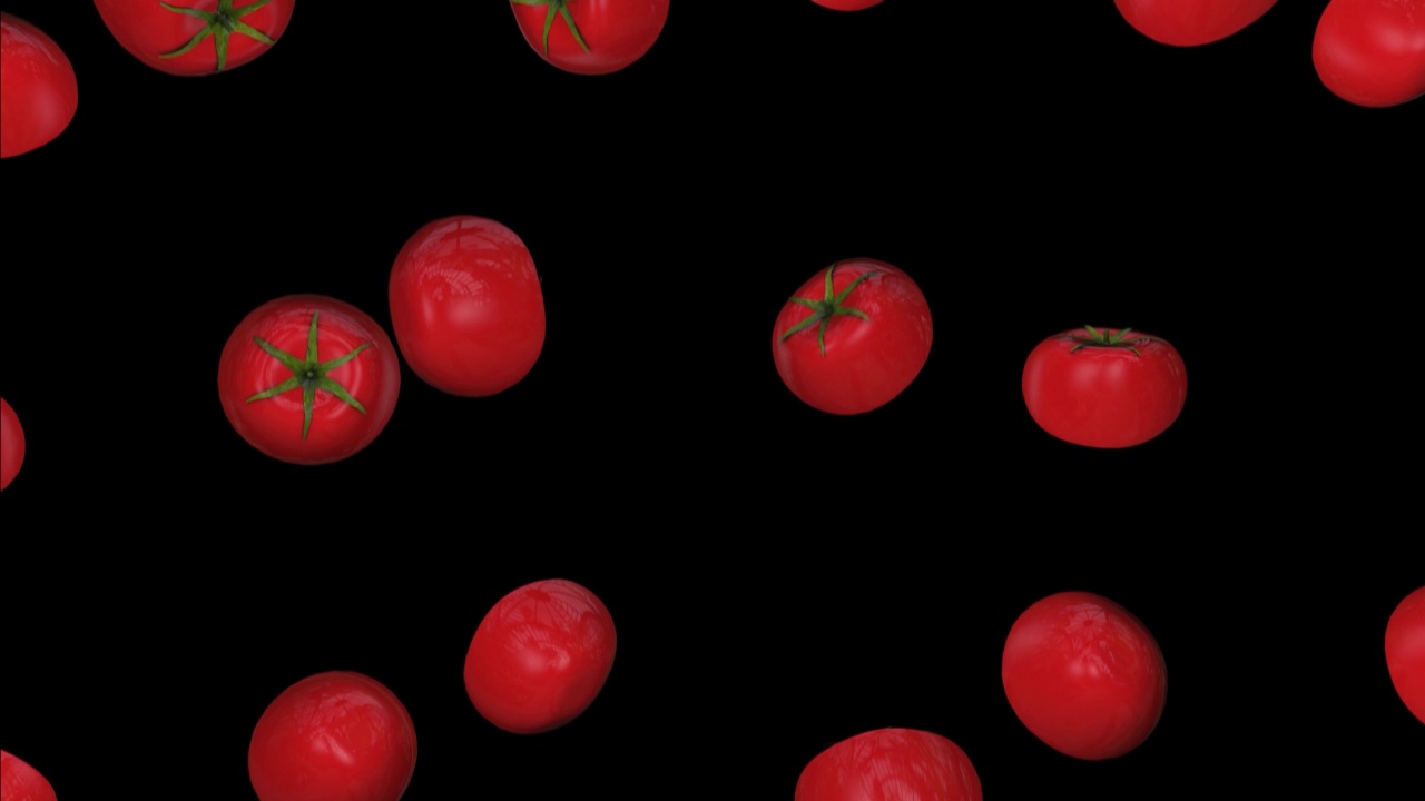 西红柿落在黑色的背景上视频素材
