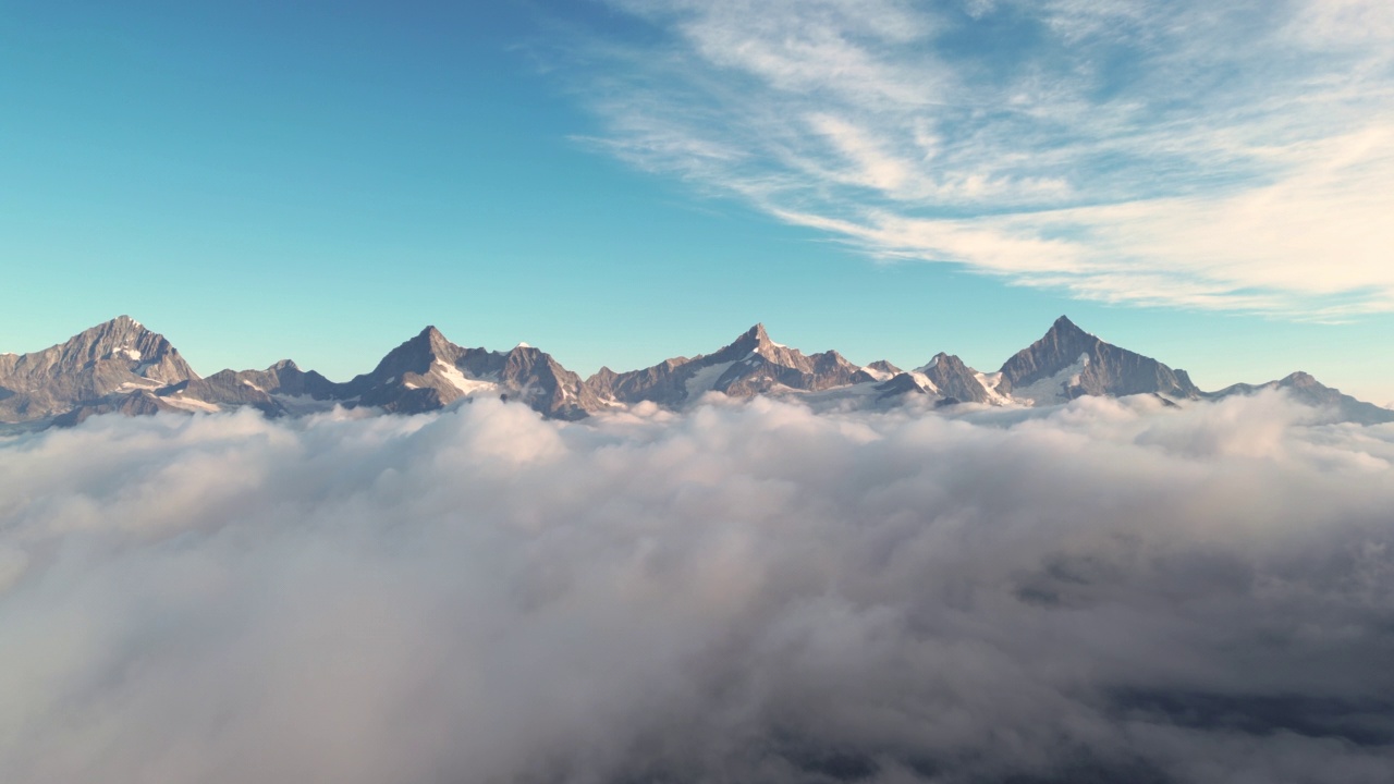 空中拍摄的瑞士阿尔卑斯山高雪山在瑞士移动拍摄在日出时间的云层之上视频素材