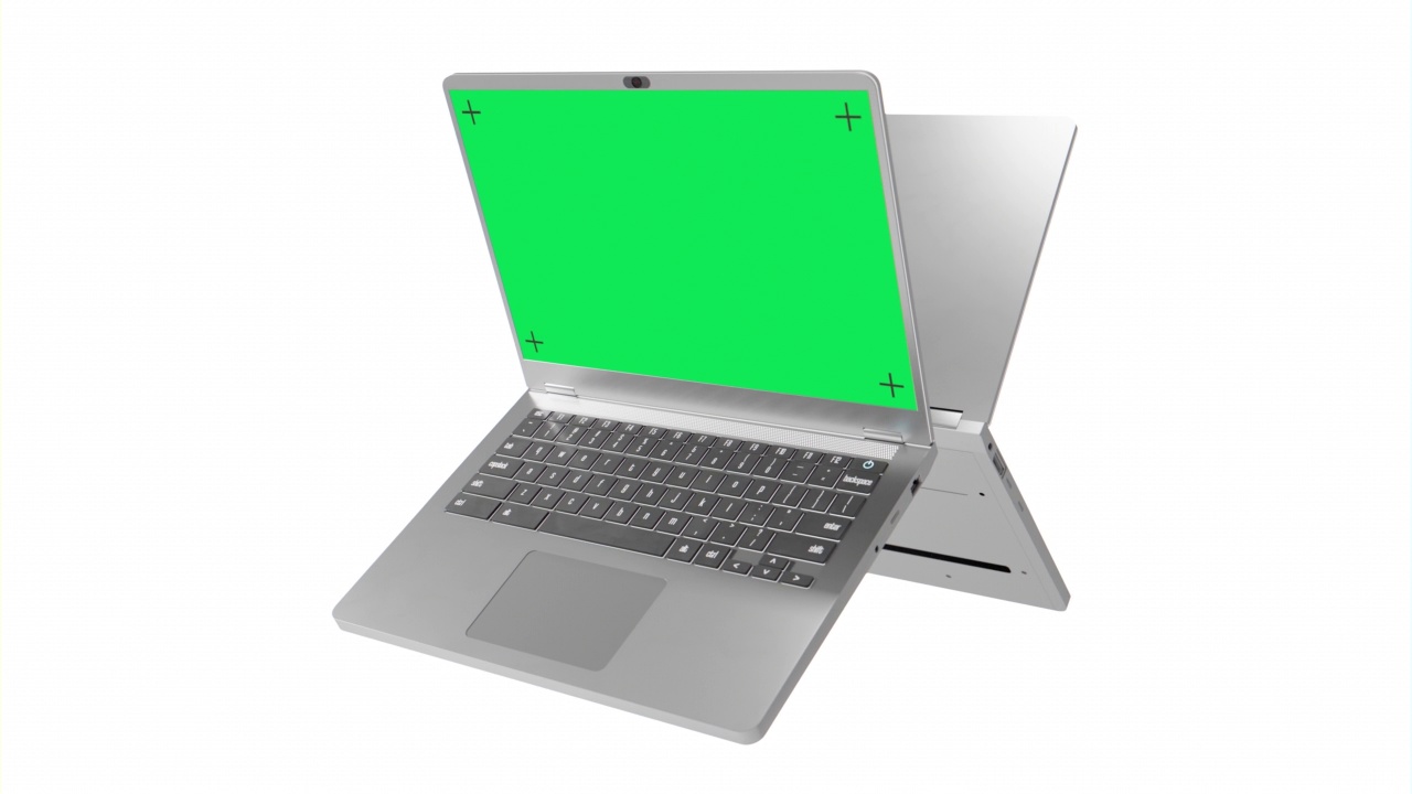 两台白色背景绿屏的银色笔记本电脑视频下载