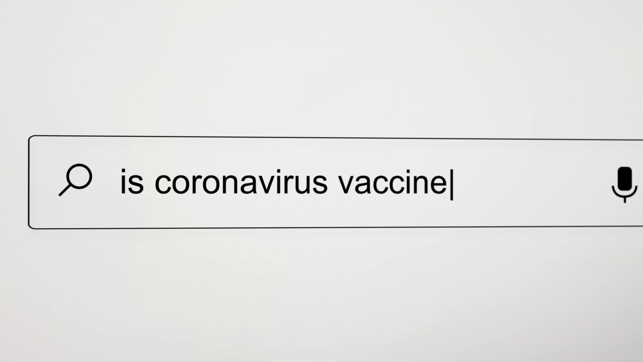 在电脑屏幕上的互联网搜索引擎浏览器中搜索“冠状病毒疫苗安全吗?”，分辨率为4K。视频素材