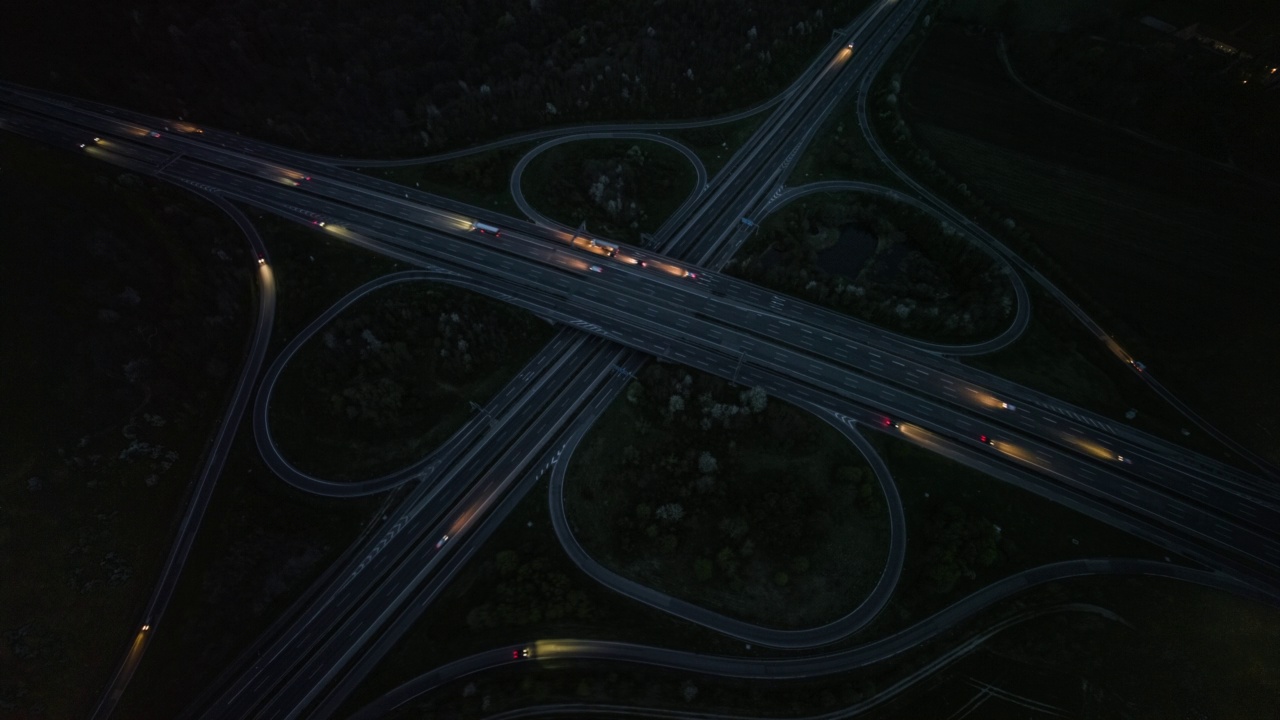 高速公路或高速公路立交桥在夜间-航拍视频素材