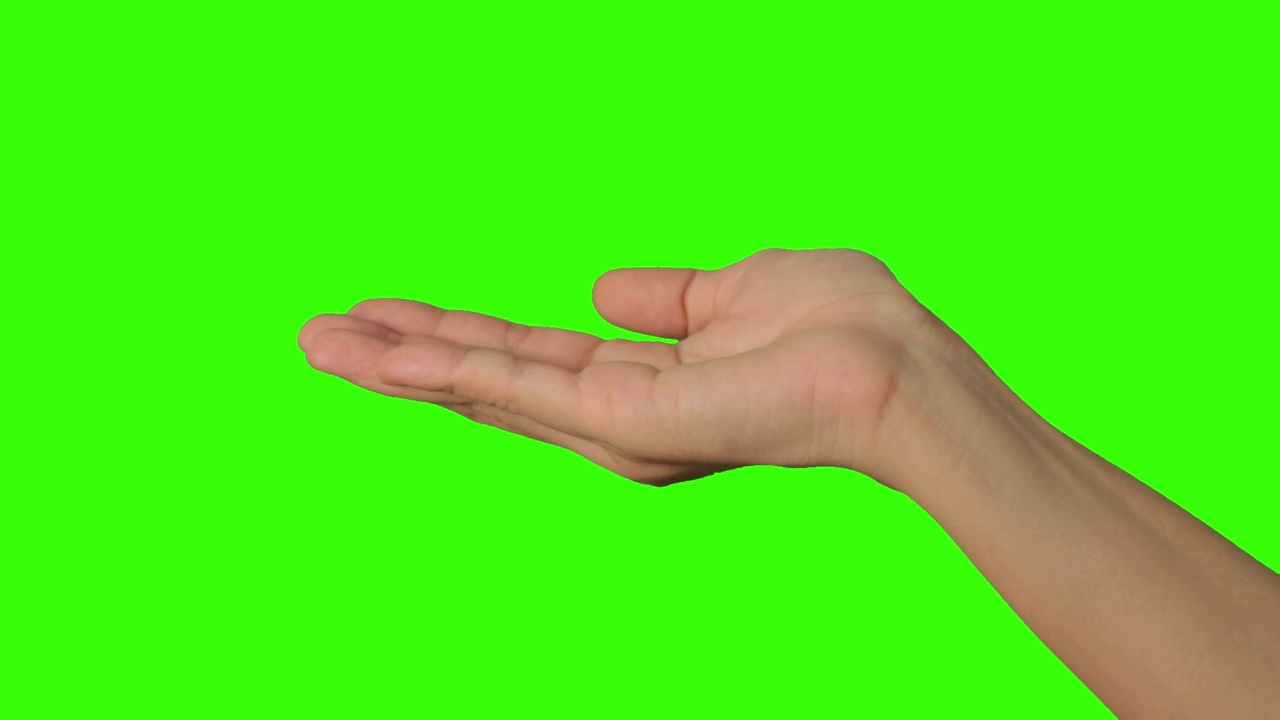 手放在绿色背景上，视频素材