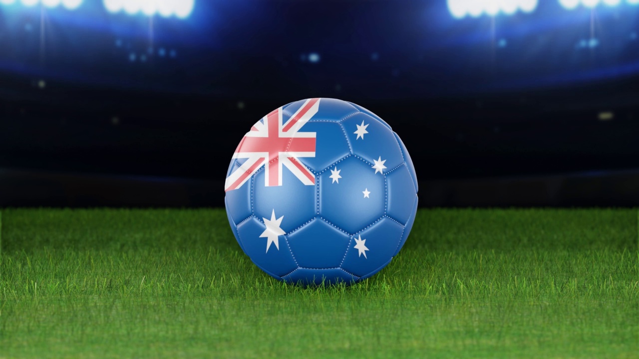 澳大利亚国旗足球，跳着灯光进入体育场。足球场和球，4K分辨率，循环库存视频视频下载