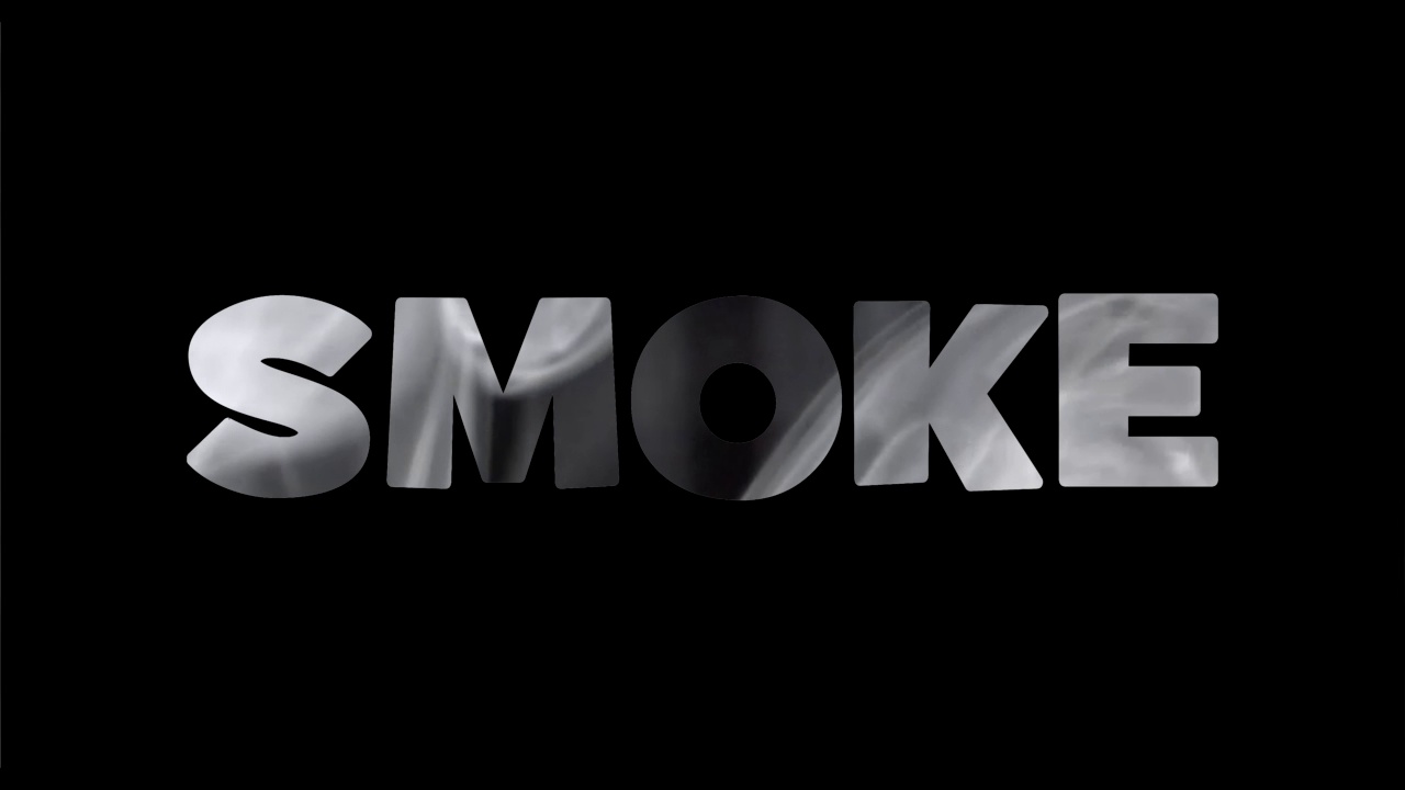 铭文在黑色背景上冒烟。以烟雾为背景的信件视频下载