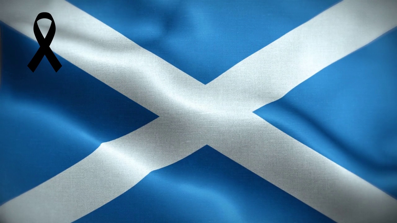 4K苏格兰国旗与黑丝带。苏格兰哀悼和觉醒日。有质感的织物图案高细节的循环。视频下载