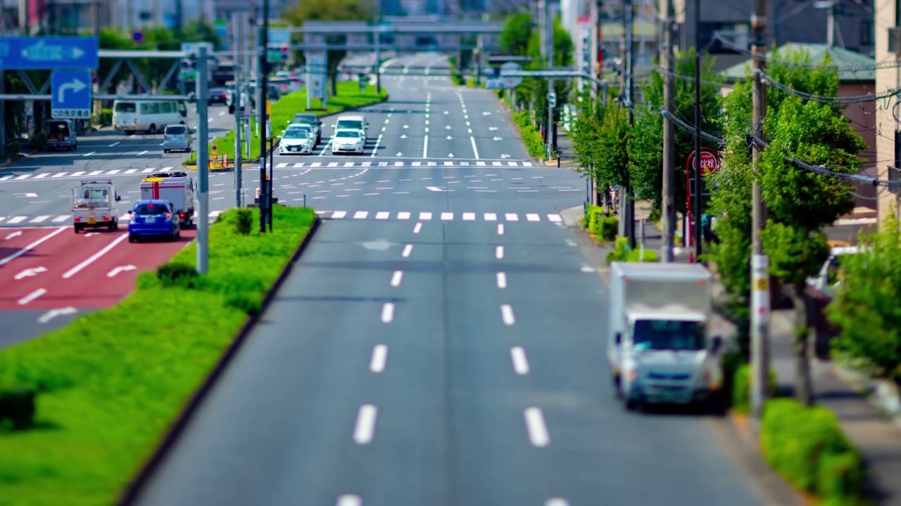 东京城市街道上的微型交通堵塞的时间推移倾斜视频下载