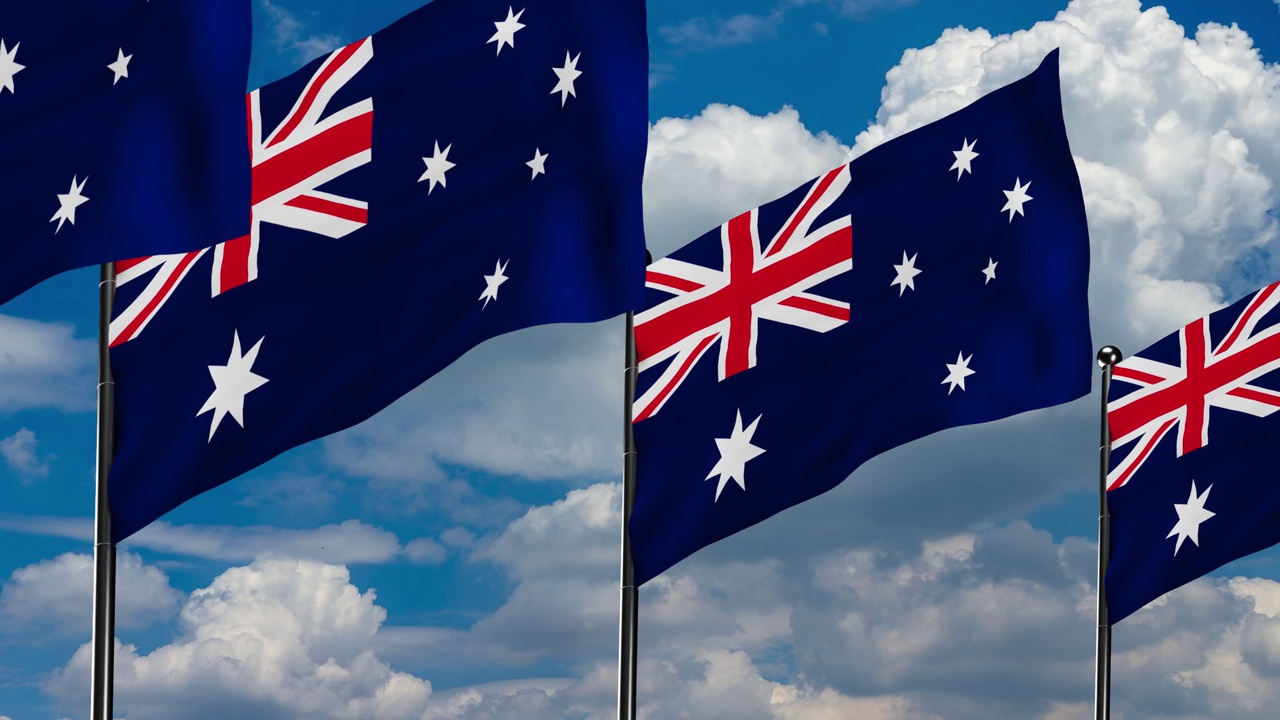 3D动画无缝循环澳大利亚国旗在风中飘扬，阳光明媚的天空背景与蓝天和白云视频下载