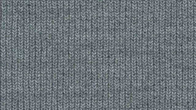 灰色针织编织背景。羊毛针织棉质地。织物材质布背景。视频下载