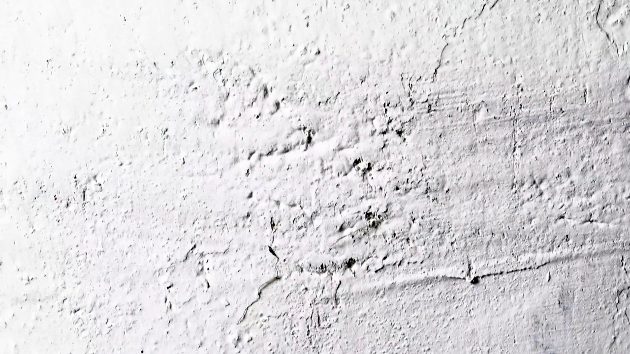 抽象的混凝土背景纹理墙与白色石膏，施工现场。视频下载