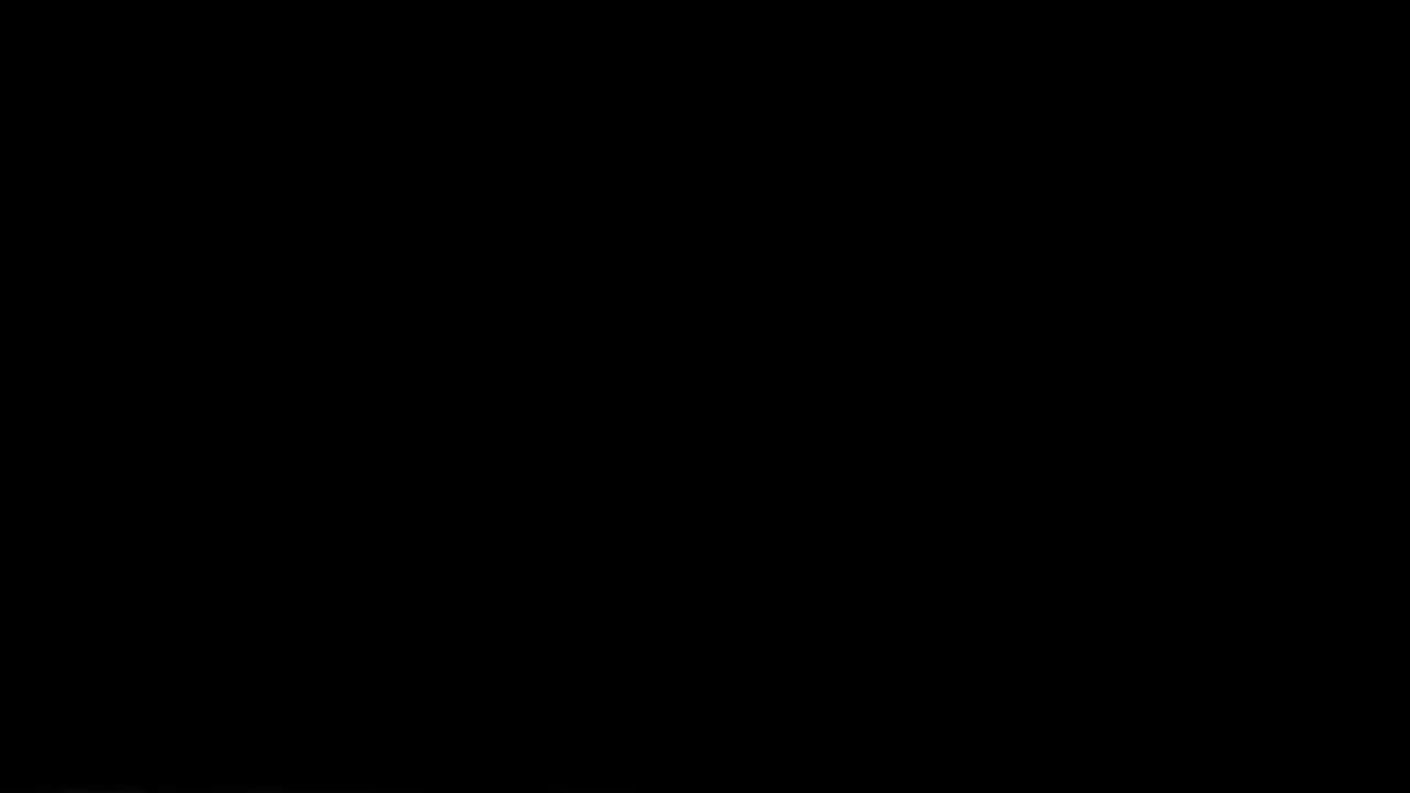 新年快乐彩色霓虹激光文字动画闪烁故障效果与发光粒子电影标题黑色抽象背景。视频素材