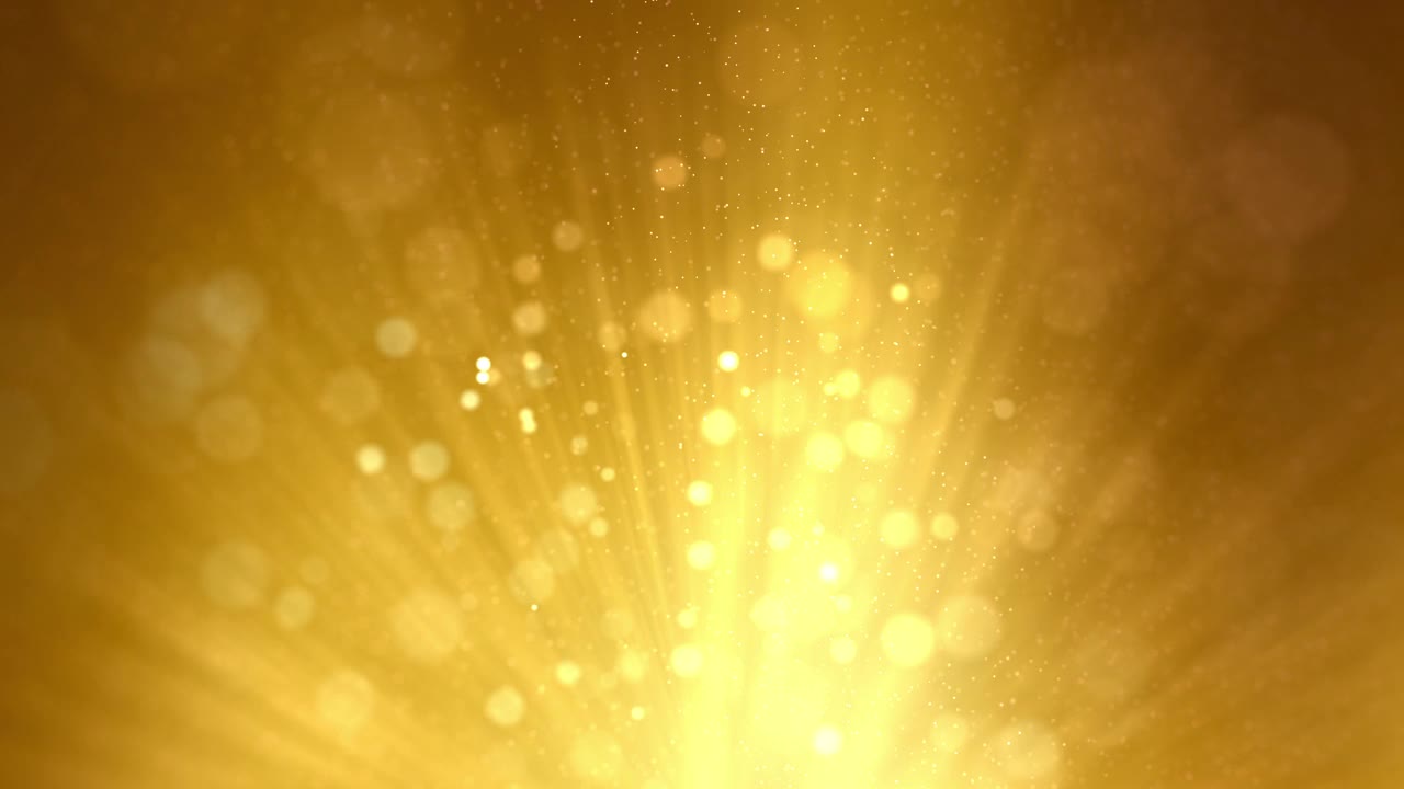 金色的颗粒闪亮的星星尘埃散景闪烁与闪耀奖抽象的背景。视频下载