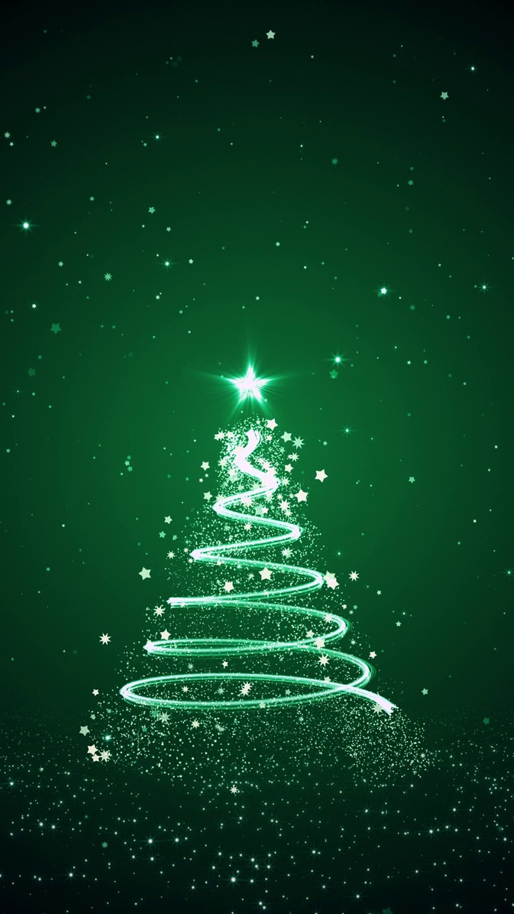 圣诞贺卡与圣诞树和飘落的雪花在绿色的背景视频下载