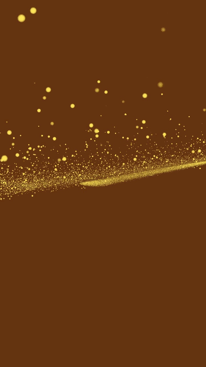 金色的小点在棕色的背景上闪闪发光，从画面中间飞起。垂直抽象星星背景派对或圣诞假期和新年的概念与复制空间。视频下载